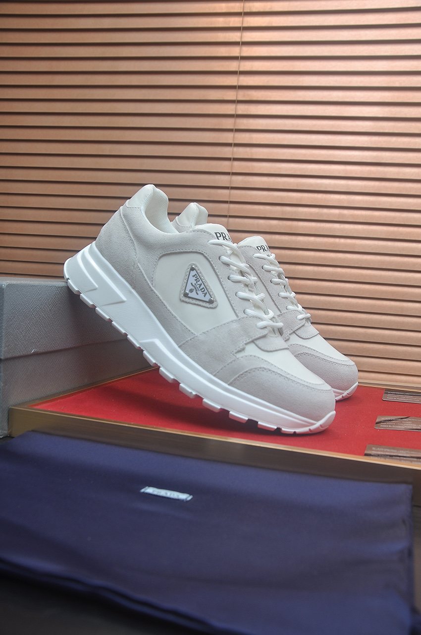 Prada Triangle Plaque Low-Top Sneakers - Lace-Up Closure
